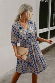 Boho Print Wrap Neck Tie Back Pleated Hem Dress