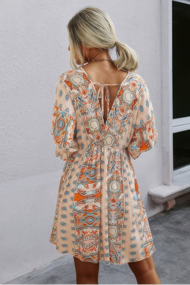 Boho Print Wrap Neck Tie Back Pleated Hem Dress